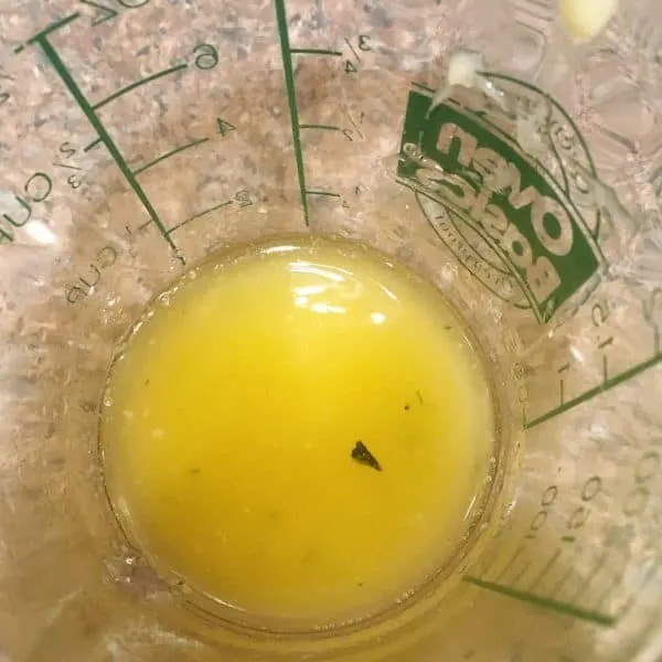 Butter and garlic in a measuring cup