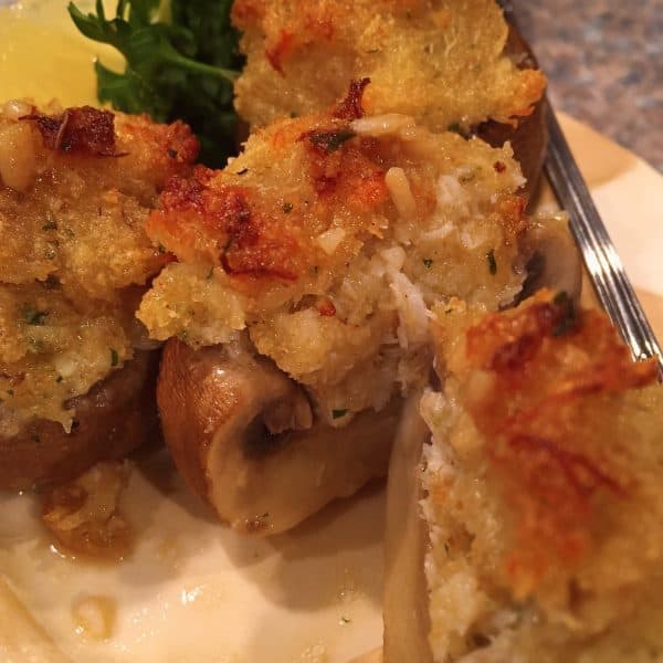 Crab stuffed mushroom sliced in half 