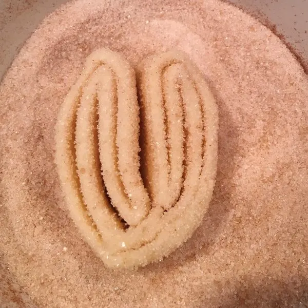 Rolling Palmiers in cinnamon sugar