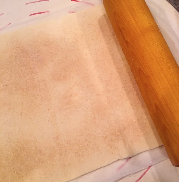 Puff Pastry sprinkled with cinnamon sugar and a rolling pin