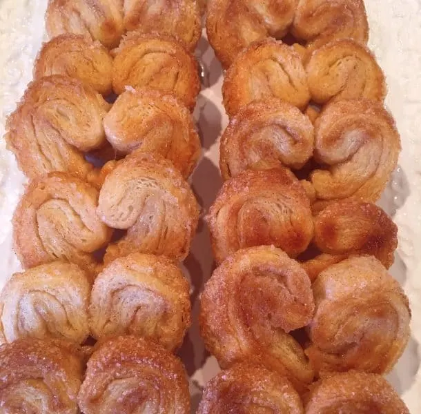 Palmier cookies on a serving tray 