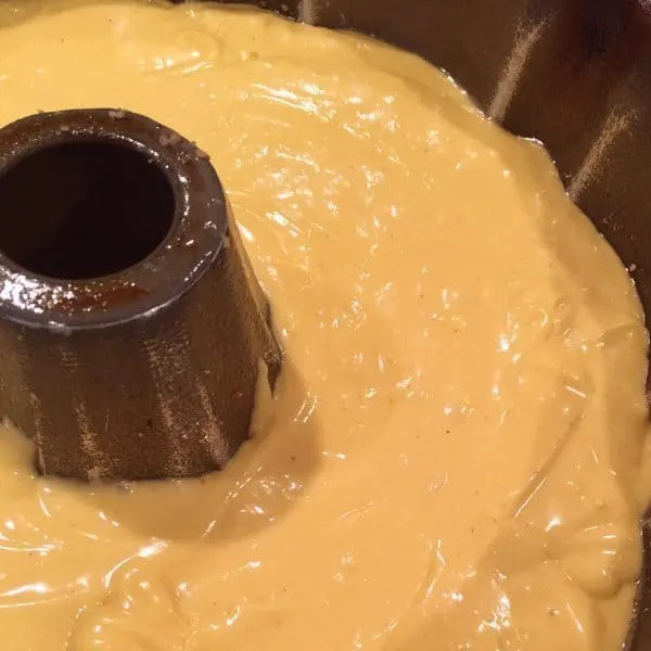 cake batter in prepared bundt pan