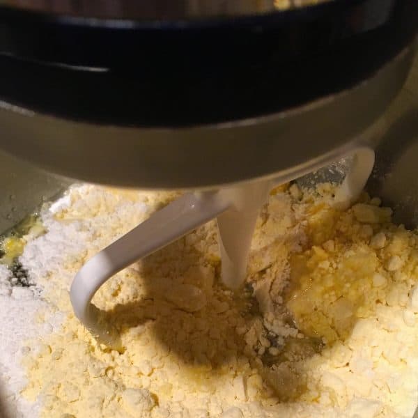 Cake mix in the mixer with wet ingredients