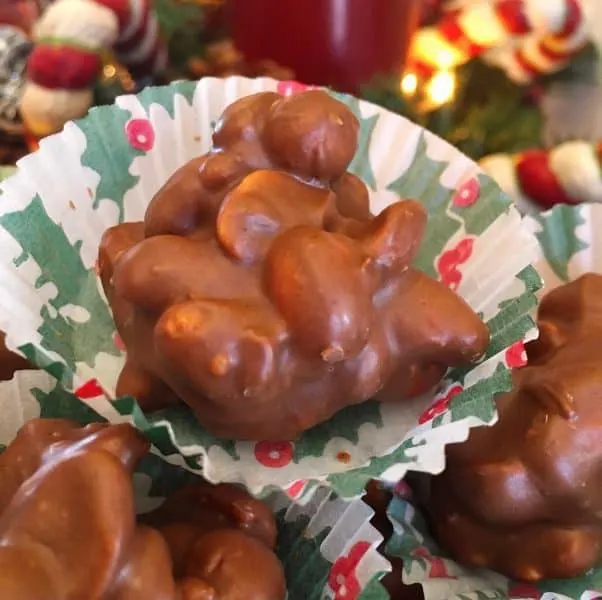 Slow Cooker Peanut Cluster in candy wrappers
