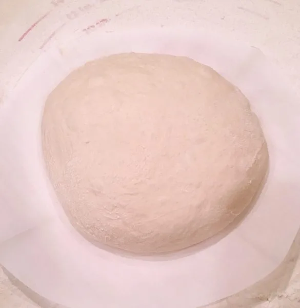 Dough in a round ready for oven