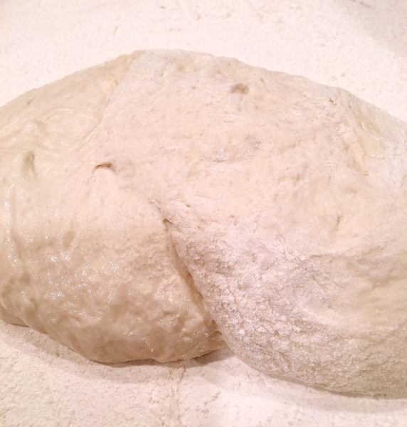 Bread dough on floured dough disc 