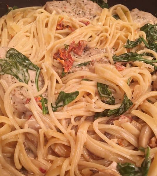 pasta, pork medallions, and cream sauce together