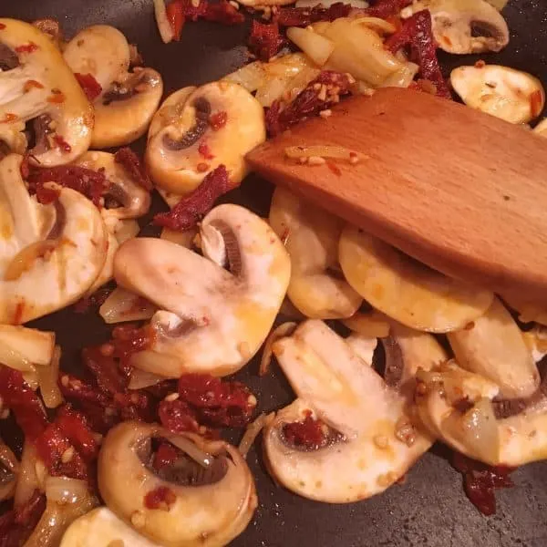 sauteed mushrooms with garlic, and sun dried tomatoes