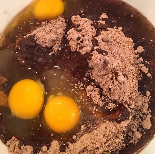 Brownie mix, eggs, and oil in a bowl ready to mix.