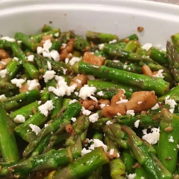 Chopped Sauteed Asparagus with toasted walnuts and sprinkled with feta cheese