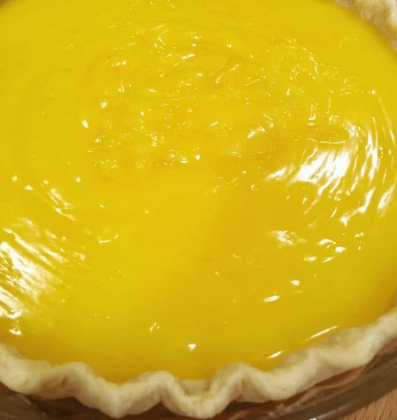Lemon Pie filling in baked pie shell before meringue topping