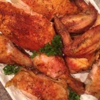 Platter filled with Roasted Rotisserie Style Sticky chicken