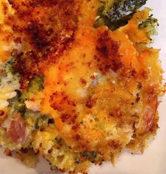 baked serving of cheesy chicken broccoli rice casserole