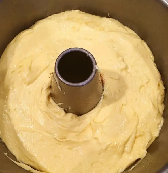 Second half of cake batter spread over cinnamon filling