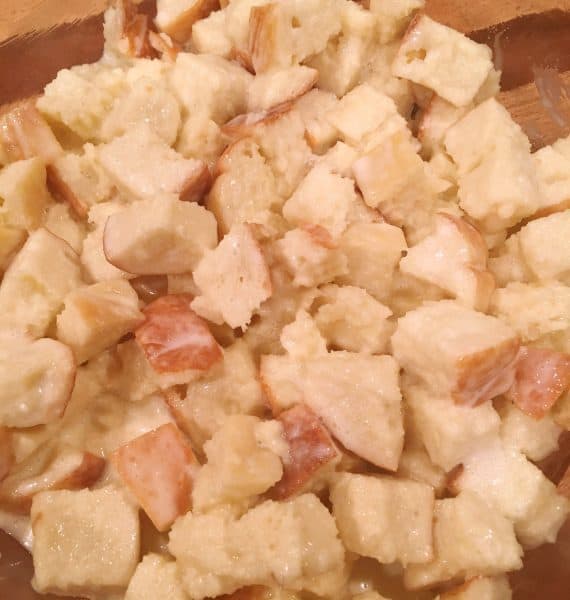 9 x 13 glass baking dish, prepped with baking spray and 3/4 of the bread mixture spread in the bottom of the pan.