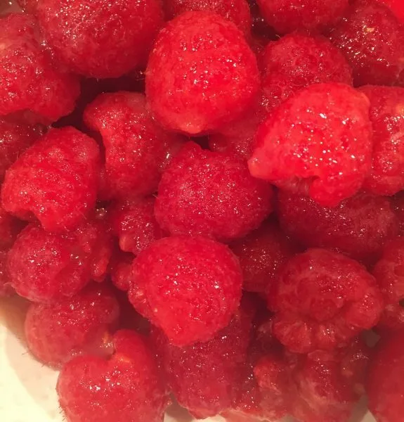 Fresh Raspberries, sugar, and apple juice all mixed together