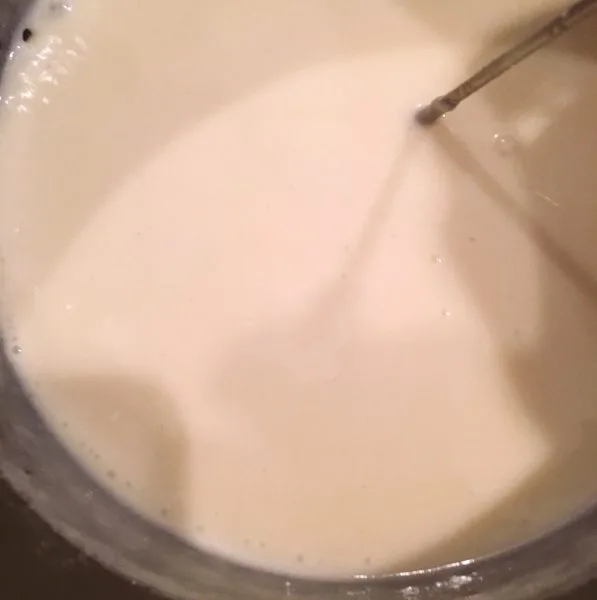 Photo of finished Vanilla Cream Sauce with Vanilla added in.