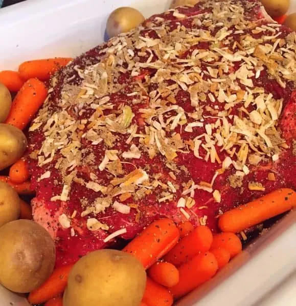 Pork Roast in Crock Pot with Potatoes and Carrots and Lipton soup mix .