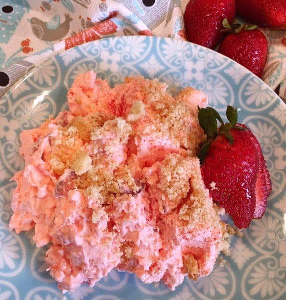 Pretty teal dish with Strawberry Pineapple Fluff Salad