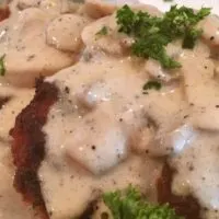 Fried Pork Chops with Creamy Mushroom Gravy