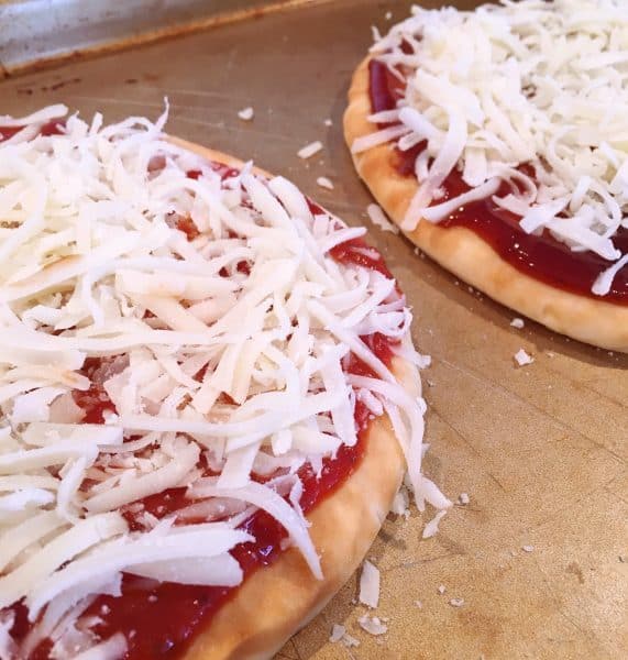 Cheese on top of Flat Bread Pizzas