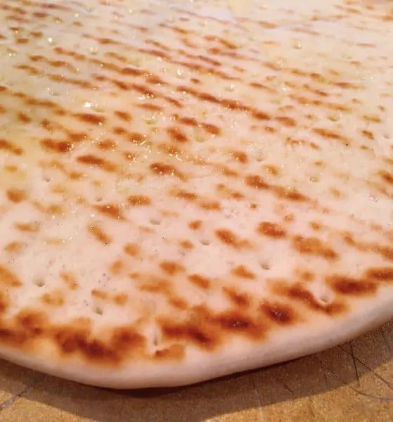Bottom of Flat Bread Brushed with Olive Oil