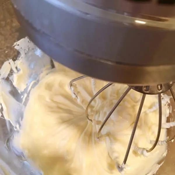 Cream Cheese and Sugar being blended together