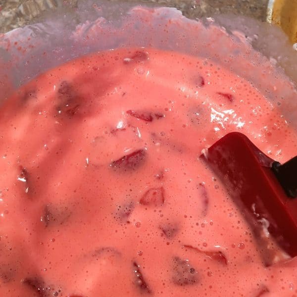 Bowl with cream mixture and fresh berries