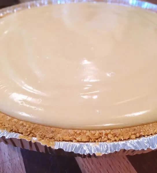 Pie filling poured into crust