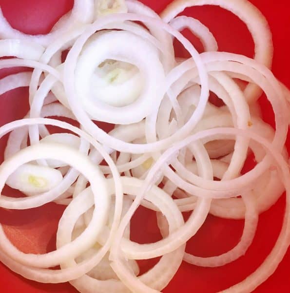 Thinly slice yellow onion