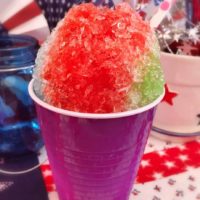 Homemade Snow Cone in a purple cup.