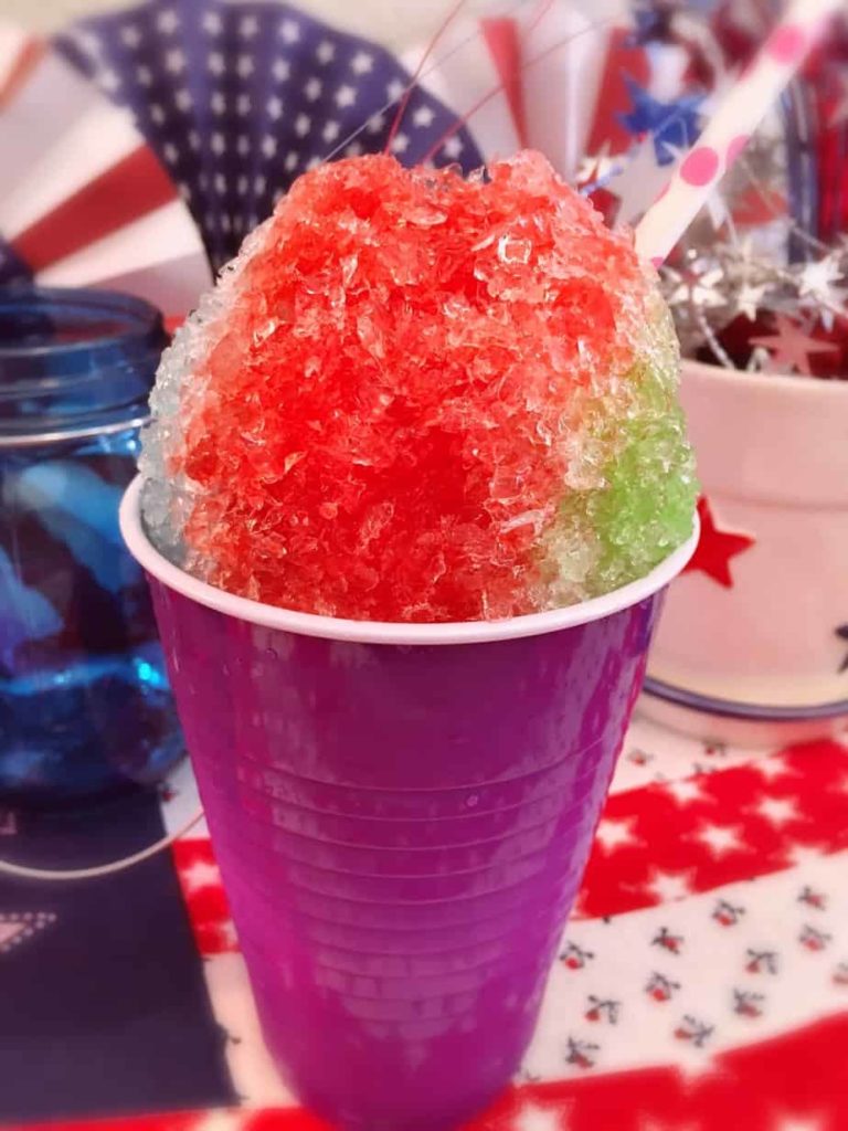 Homemade Snow Cone in a purple cup.
