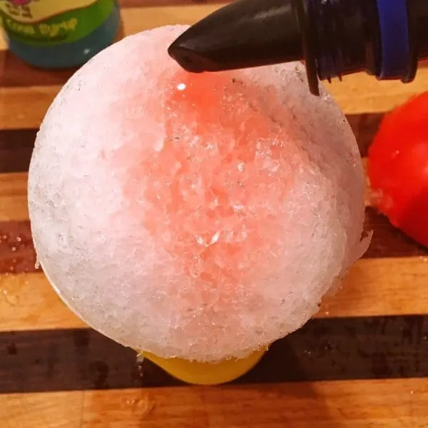 Snow cone syrup in pour bottle