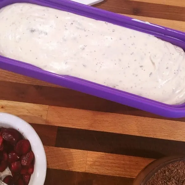 Pouring Ice Cream Mixture into container.