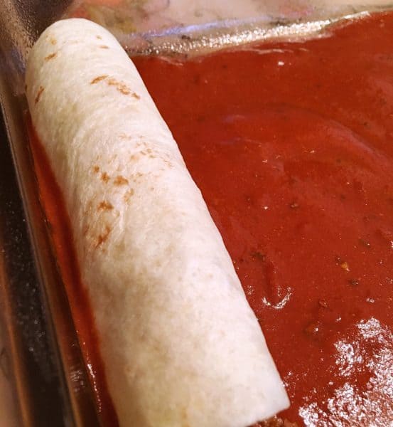 Placing Enchiladas in baking dish