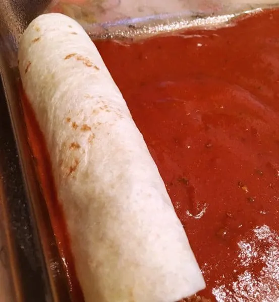 Placing Enchiladas in baking dish