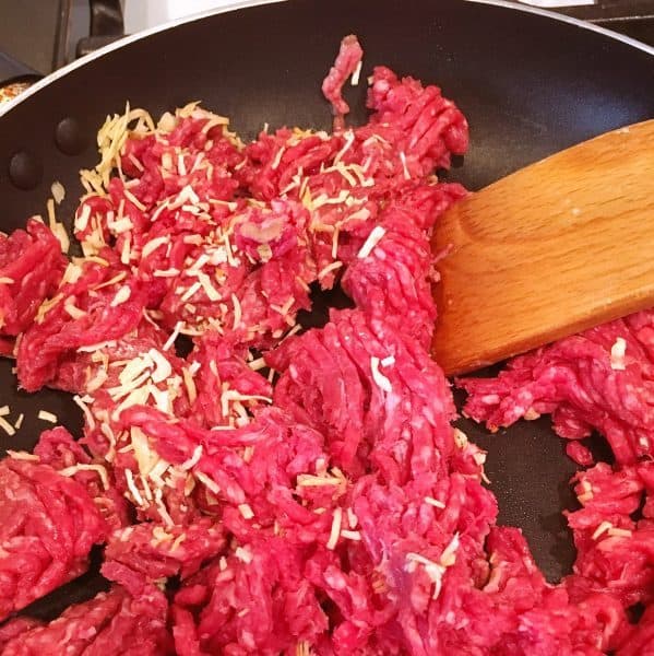 Browning Ground beef in skillet