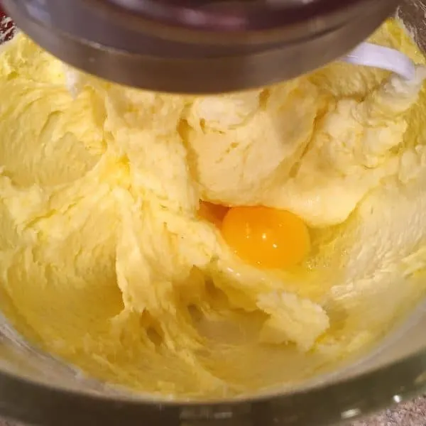 Eggs being added to cake batter