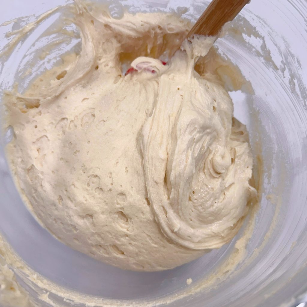 Cake batter in mixing bowl.