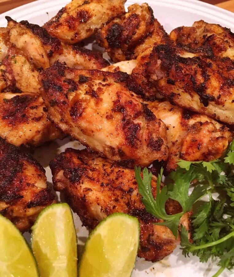 Grilled wings on plate