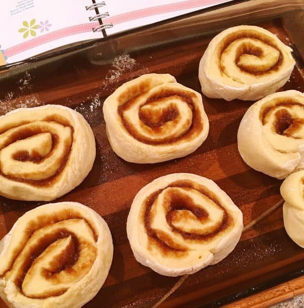 Cut Cinnamon Roll Dough in glass baking dish