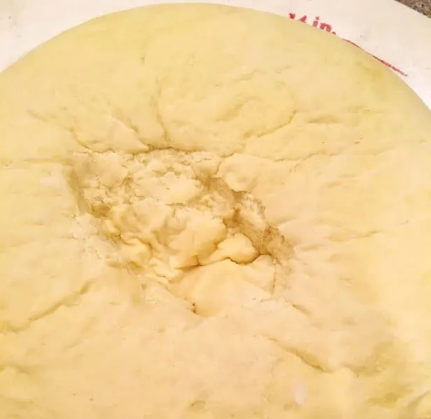 Punched down roll dough