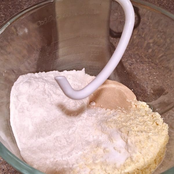 Mixing bowl with Cake Mix, Flour, Yeast, and Salt
