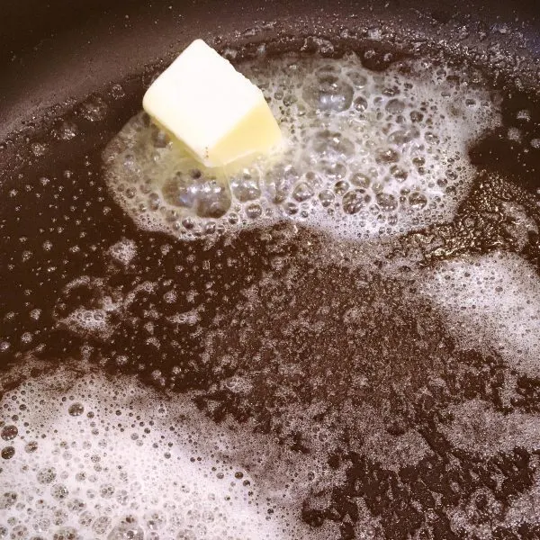 Butter melting in a large sauce pan