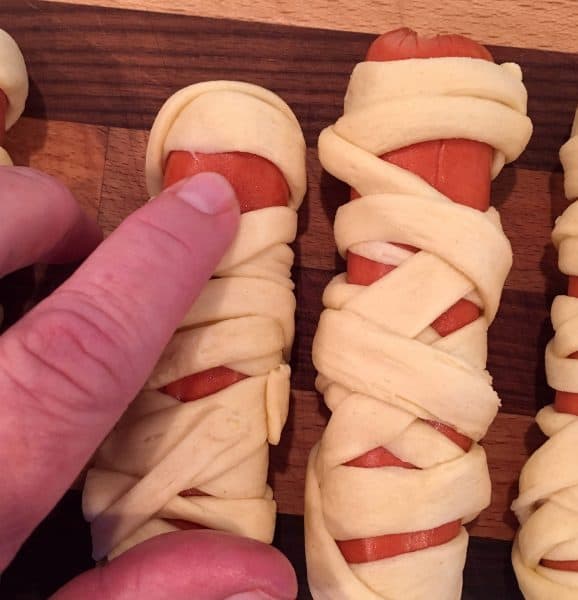 Hot dog wrapped in crescent dough strips