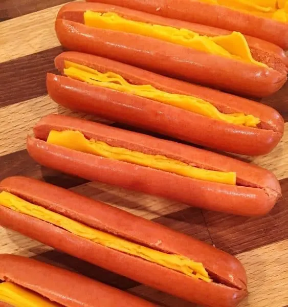 Slit Hot Dogs stuffed with Cheddar Cheese