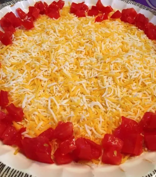 Chopped Tomatoes around edge of dip