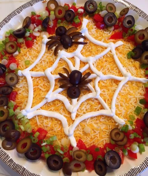 Sour cream spider web on dip