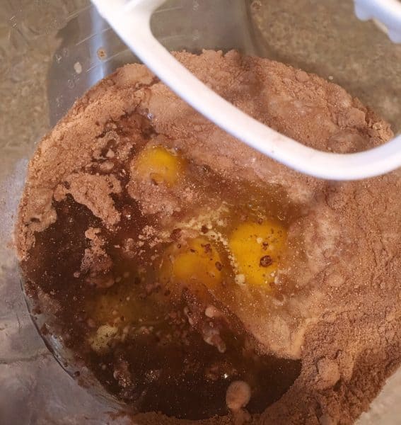 Cake mix with 4 eggs in mixing bowl