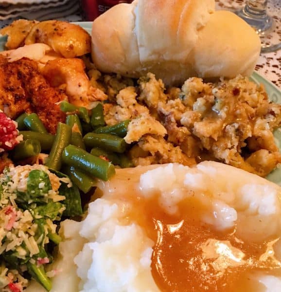 Full dinner plate with chicken and stuffing